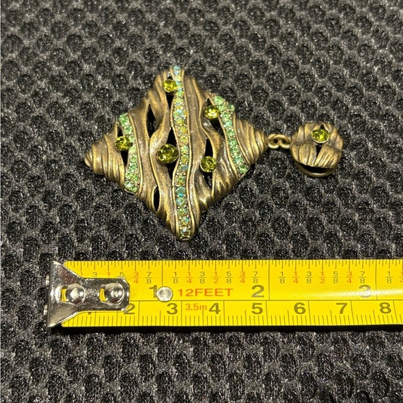 Wavy Textured Gold-Tone Pendant with
Sparkling Green Gems - Picture 7 of 9